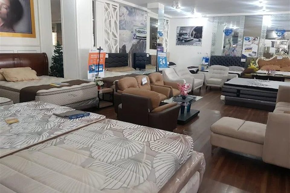 Furniture showroom with beds and sofas